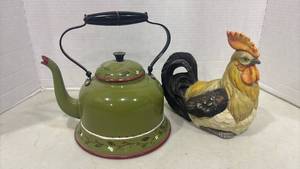lot 1082 image: Mibroso Green Enamel Teakettle with Black Handle and Rooster Figurine