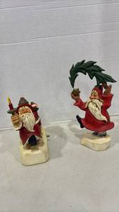 lot 1104 image: David Frykman 1994 Oh the Joy and Music Box Here Comes Santa Clause. Tallest is 12 inches