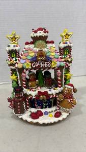 lot 1112 image: Gingerbread Cookie House Music Box that plays We Wish You A Merry Christmas