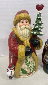 lot 1120 image: Pair of Santa Clause Figurines with Tree and Basket 11 inch tall