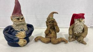 lot 1121 image: Three Santa Gnome Figurines with some damage on fingers. Tallest is 6 inches