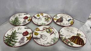 lot 1137 image: Six 9 inch William Sonoma 2011 Christmas Cards Plates. Two plates have small chips on them as seen in picture.