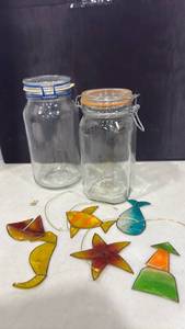 lot 1154 image: 2 Glass Hinged Lid Storage Jars with Stained Glass Ornaments