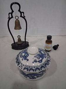lot 1175 image: Blue and White Dragon Ceramic Covered Bowl with Black Bell Stand,and Frankincense Essential Oil