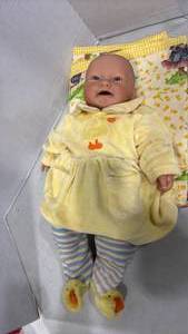 lot 1189 image: Baby Doll with Yellow Outfit and Blanket