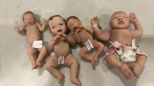 lot 1209 image: Clay Polymer Babies 3 to 4 inches long. One has a broken finger
