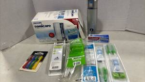 lot 1250 image: Philips Sonicare UV Sanitizer with Replacement Heads and Accessories