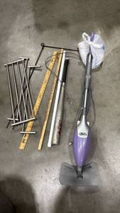 lot 2079 image: Shark Handheld Steam Cleaner with Pads, Rulers, Yard Flag Holder, Bat and more