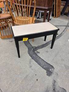 lot 25163 image: Wooden bench featuring a contrasting light-colored top and black-finished tapered legs