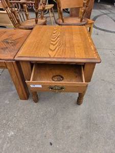 lot 11 image: Wood end table with single drawer