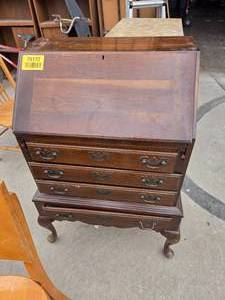 lot 25172 image: Vintage Queen Anne-style wooden slant-front secretary desk with a drop-down writing lid and four lower drawers