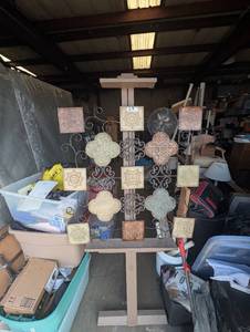 lot 63 image: Decorative square metal wall hanging featuring an arrangement of embossed clover and patterned tile accents in rustic bronze and copper tones