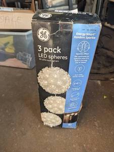 lot 146 image: GE 3-pack of Energy Smart Random Sparkle LED spheres featuring 50 LEDs per 5.5-inch sphere.