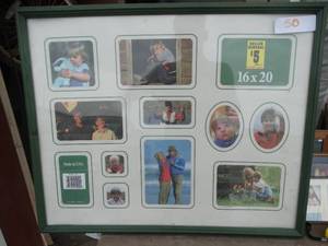 lot 50 image: 16x20 Multi-opening green collage photo frame holding various small pictures
