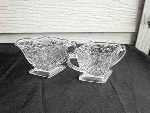 lot 1499 image: Glass Creamer Pitchers with Floral and Geometric Pattern - 2 ct