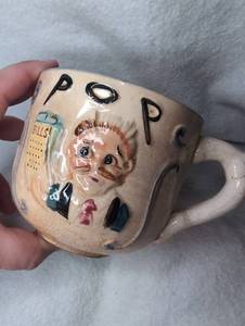 lot 1503 image: Ceramic Hand painted Pop Mug with Hand-Painted Pop Art Face Design