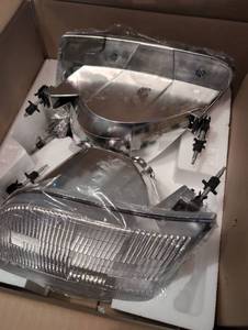lot 2001 image: Headlight Assembly Set FDPU97.00-1FDPU97A.14 -new in box