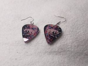 lot 3002 image: Olivia Rodrigo Guitar Pick Earrings Guts World Tour