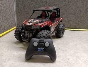 lot 105 image: 2.4GHz Polaris General 1000 RZR RC Remote Control UTV Red White Black - Untested