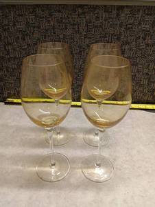 lot 124 image: Set of 4 Glass Wine Glasses with Amber Base 10 inches Tall