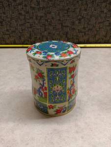 lot 142 image: Decorative Cylinder Tea Tin with Tea Packets