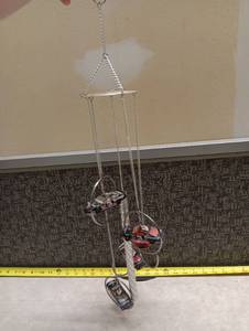 lot 176 image: Racing Car Mobile Wind Chime 4 Die-Cast Cars Hanging Decoration