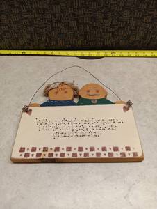 lot 213 image: Handcrafted Wood Grandparents Wall Hanging Sign with Couple Figures with the message Were not rich and famous... but we do have priceless grandchildren