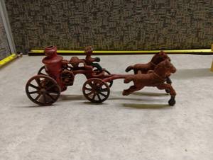 lot 226 image: Cast Iron Horse-Drawn Fire Wagon Toy with Two Figures