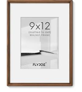 lot 1139 image: 9x12 Picture Frame, Solid Walnut Wood Frame with Mat for 6x8 Photo - Retail $0