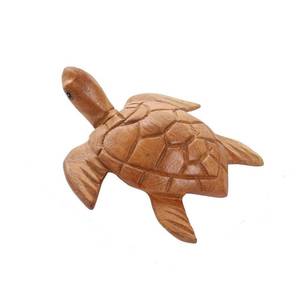 lot 1278 image: DUONGJAIS BRAND Hand Carved Wooden Sea Turtle Figurine, Handmade Sea Turtle Statue, Coastal Beach House Decor, Wooden Marine Animal Sculpture, Gift for Turtle Lovers (Natural Color Sea Turtle) - Retail $16