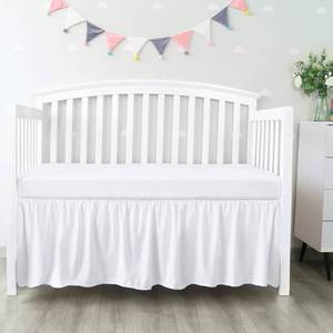 lot 1440 image: Crib Bed Skirt 14 Drop, Fits 28x52 Crib, Adjustable, White - Retail $20
