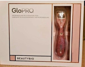 lot 77 image: BeautyBio GloPRO Microneedling Regeneration Tool LE Rose Gold Glitter