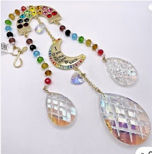 lot 125 image: Kirks Folly Rainbow Bridge Love You Moon Ornament SILVER