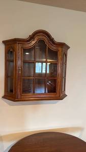 lot 913 image: Wall mount curio 29x30x8 located in basement