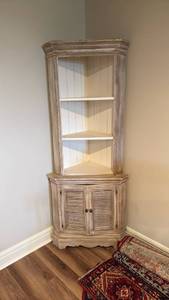 lot 914 image: Corner cabinet 70x30x17 located in basement