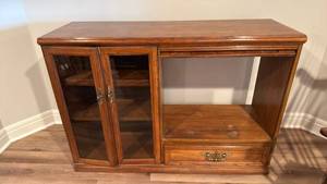 lot 916 image: Entertainment cabinet 37x53x18 located in basement
