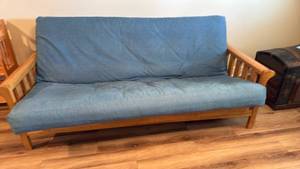 lot 920 image: Wood frame futon 37x83x40 located in basement