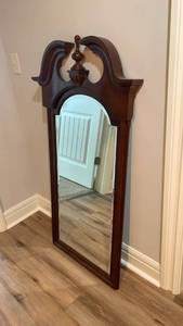 lot 931 image: Wall Mirror with Decorative Pediment Top and Finial located in basement 48X25