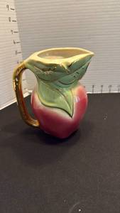 lot 1002 image: Vintage pottery pitcher marked USA