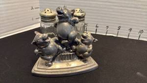 lot 1012 image: Vintage salt and pepper shaker set features a silver-plated stand depicting the Three Little Pigs manufactured by W B Mfg Co.