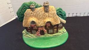 lot 1036 image: Cast iron door stop 5.5x8