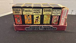 lot 1045 image: Vintage 1946 Mickey Mouse Library of Games set manufactured by the Russell Manufacturing Company.