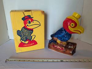 lot 1103 image: Jayhawk decanter box with miss-matched Jayhawk decanter Ezra Brooks 150