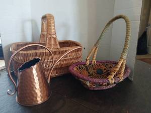 lot 1176 image: Copper watering can with   Baskets  largest 12x12.5x9