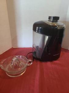 lot 1204 image: Vintage glass juicer  and a Hamilton Beach electric juicer.