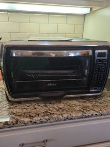 lot 1207 image: Oster Toaster Oven, 12x20x16