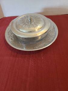 lot 1210 image: Wilson hand-wrought aluminum serving pieces with Pyrex casserole, tray is 12in diam.