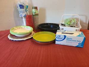 lot 1212 image: Plastic disposable plates, cups, and cutlery