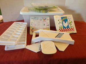 lot 1216 image: Mandolin kitchen slicer , trivets  bicycle plates with sterlite tote