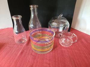 lot 1271 image: Striped bowl, clear apple cookie jar with lid, 2 milk bottles, small heat resistant pitcher.